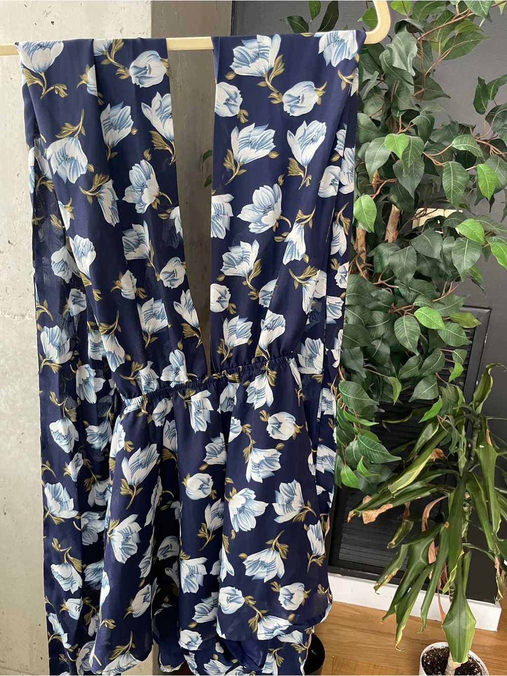 Lulu's Navy Blue Floral Romper with Light Blue Flowers and Adjustable Straps